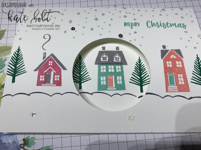 From Our House To Yours Christmas card with circle aperture.  Snowy street scene Christmas card using rubber stamping.
