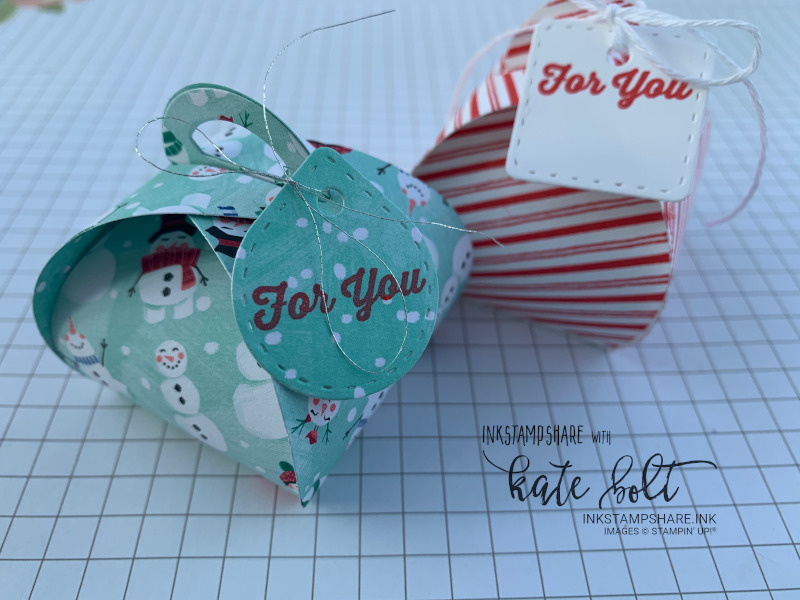 Mini Curvy Keepsake Dies and Tiny Keepsake stamps used to make Christmas table boxes and  favours. one stamped in Poppy Parade candystripes and  another cut out of the Let It Snow Designer Series Papers.