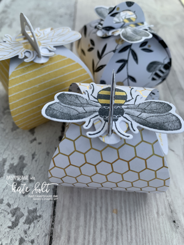 Three little Honey Bee gift boxes with bees on top. made using the Mini Curvy Keepsakes box dies from Stampin Up!