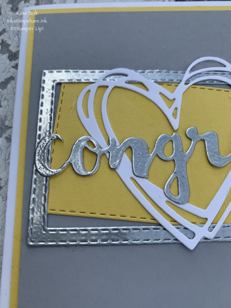 Congratulations card using the Sunshine Wishes dies from Stampin Up, in Daffodil Delight, Smoky Slate and Whisper White with silver heat embossed frame.