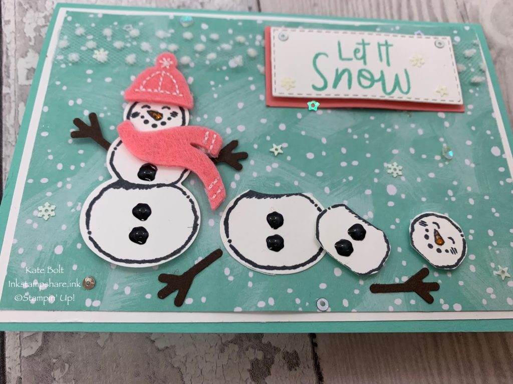 Snowman Christmas card using the Snowman Seasons stampset and punch from Stampin Up, with Shimmery Crystal Effects, Snowflake Sequins and the Let It Snow Speciality Designer Series Paper and the Let It Snow Embellishment Kit.