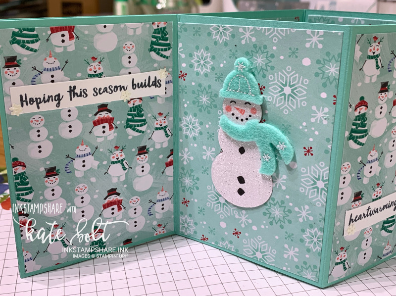 Fancy Fold Christmas Card. Z fold card with fun juggling snowman on the front. The inside folds out to show two more sparkly snowmen dressed up in hats and scarves using the Let It Snow Embellishment Kit. The inside has the Snowman Season Designer Series Paper.