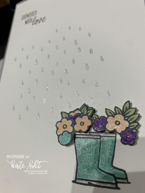Under My Umbrella card using #simplestamping for Coffee and  Cards. This one had a rain shower, shimmery boots in Coastal Cabana with flowers tumbling out of the top.