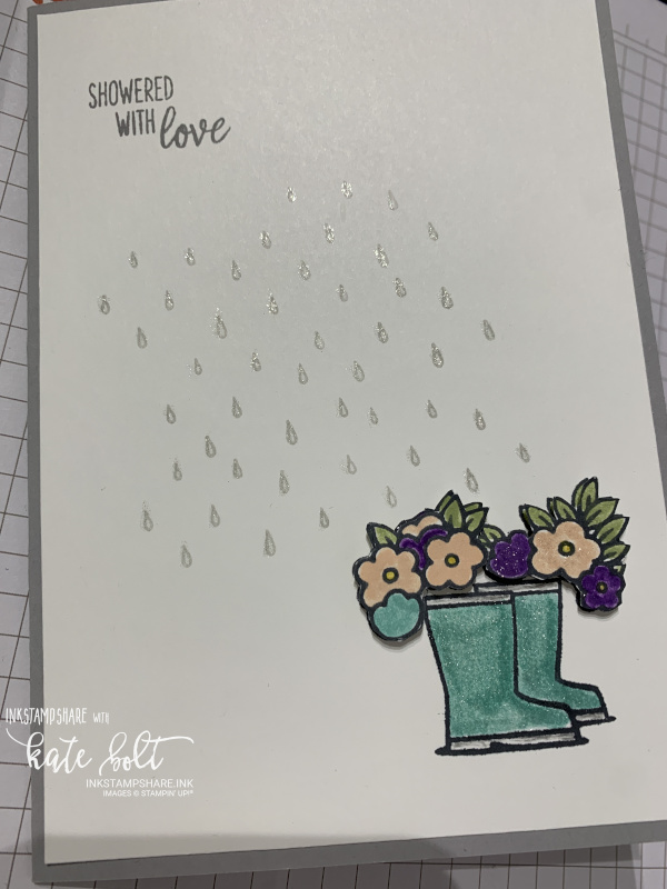 Under My Umbrella card using #simplestamping for Coffee and  Cards. This one had a rain shower, shimmery boots in Coastal Cabana with flowers tumbling out of the top.