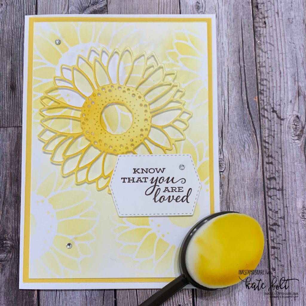 Hand made card featuring a soft background of sunflowers and  a sunflower die coloured with Daffodil Delight ink using blending brushes. All products from Stampin' Up! Made by inkstampshare.ink