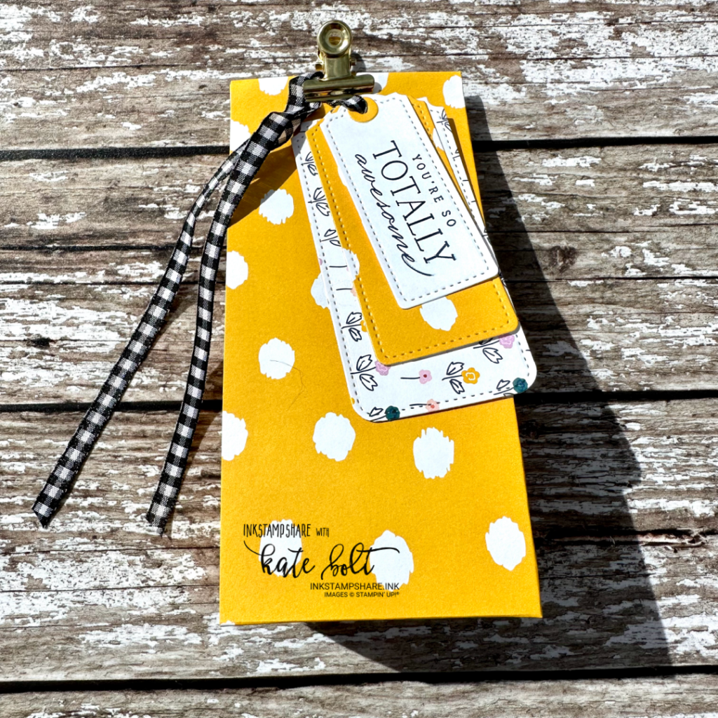 Create an easy gift bag using the Delightfully Eclectic Papers from Stampin Up with measurements. Using the Tailor Made Tag dies for the tags. This one in yellow.